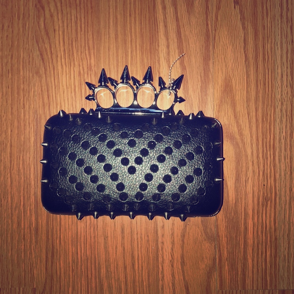 Black studded clutch